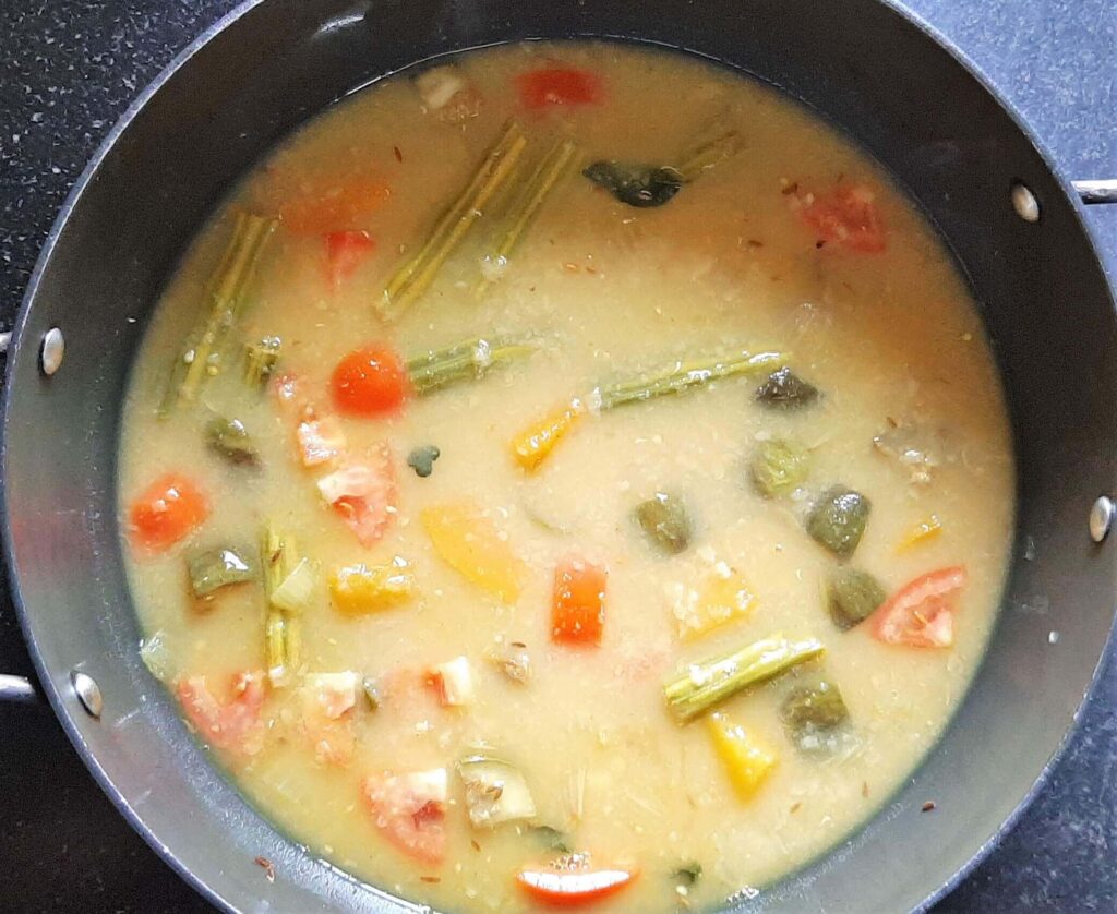 Add dal in sambar vegetables