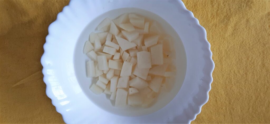 Chopped potatoes in saltwater