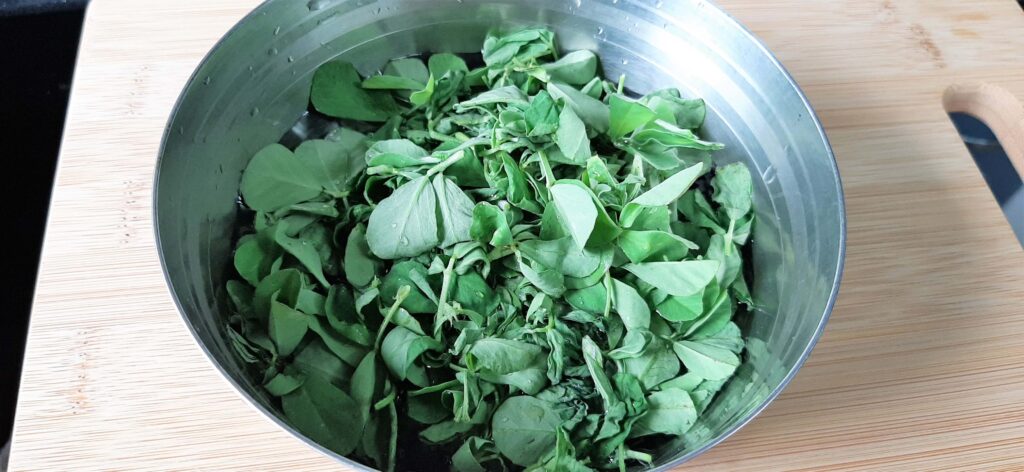 Pulked methi leaves in a bowl