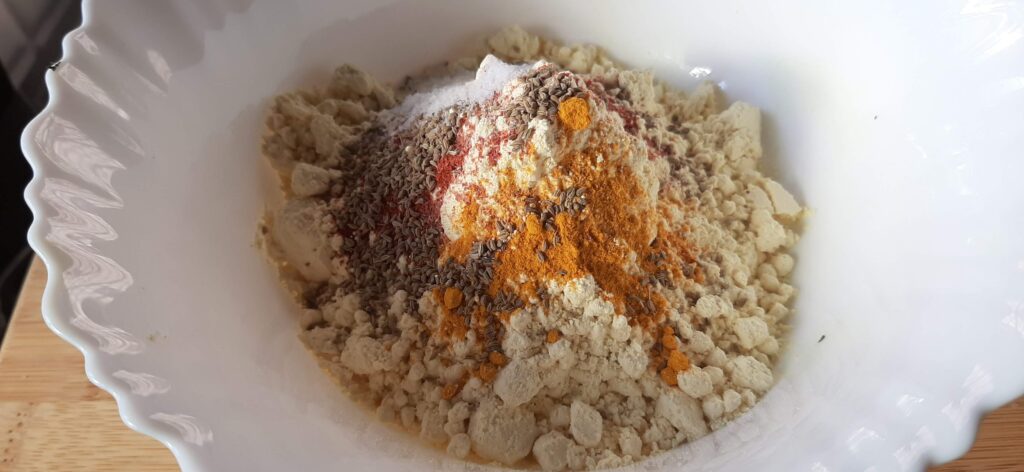 Batata vada coating mixture in a bowl