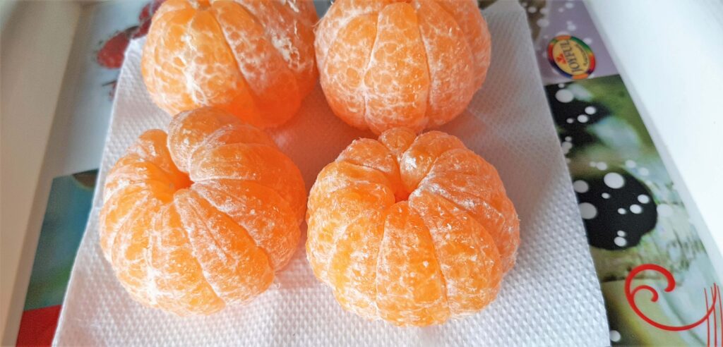 4 peeled oranges