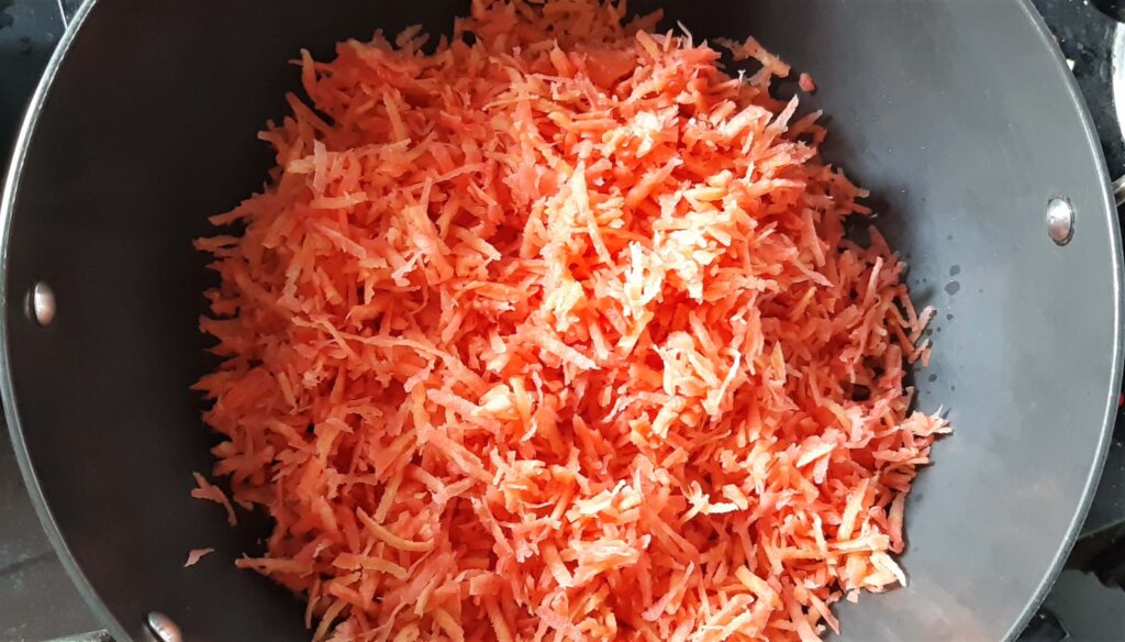 adding grated carrots