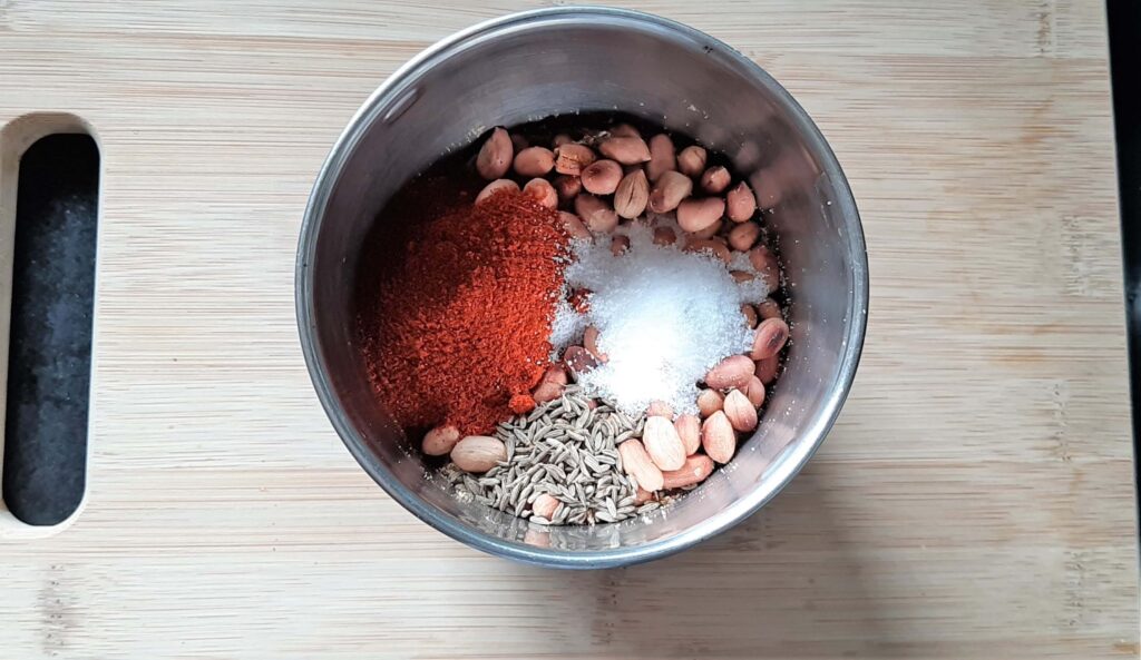 Peanuts & spices in grinder