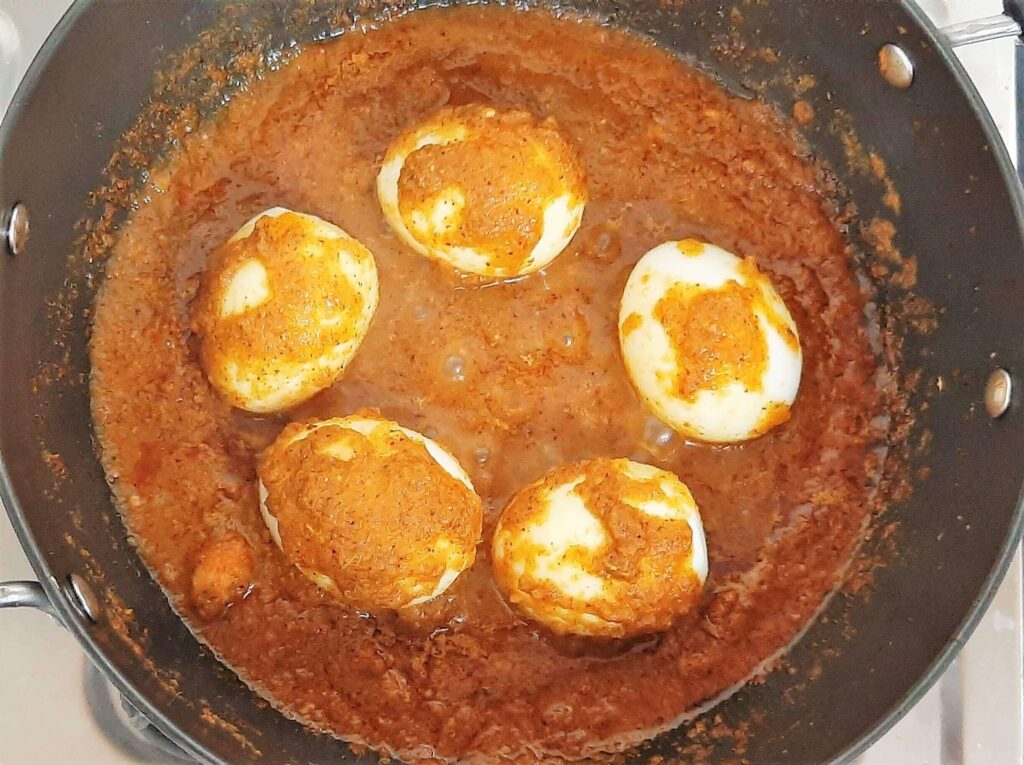 added boiled eggs in a curry