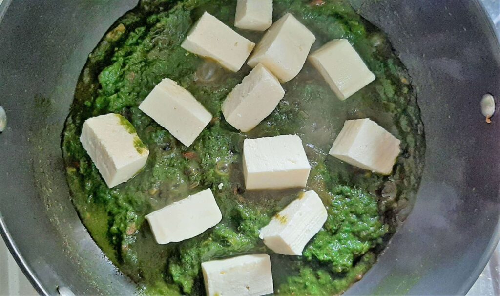 adding paneer cubes