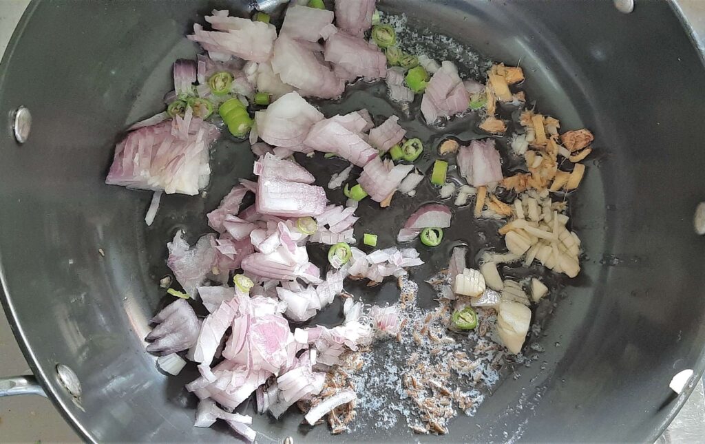 sauteing onion for punjabi palak paneer