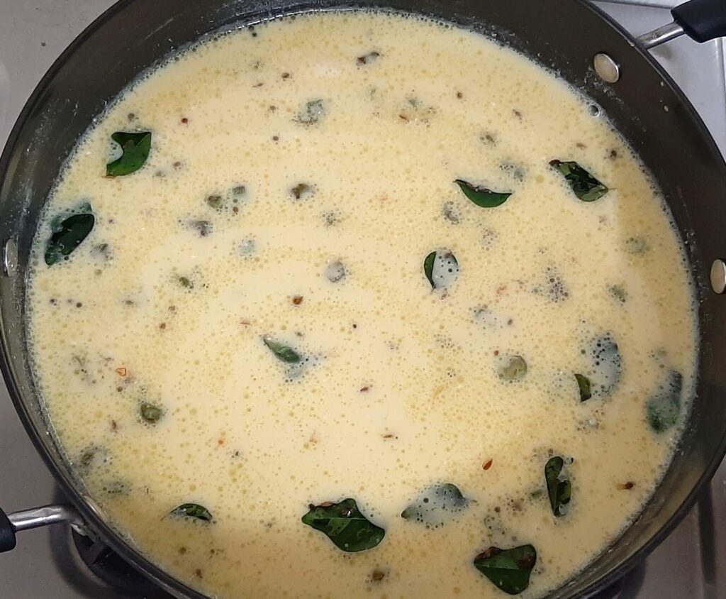 Adding dahi besan mixture