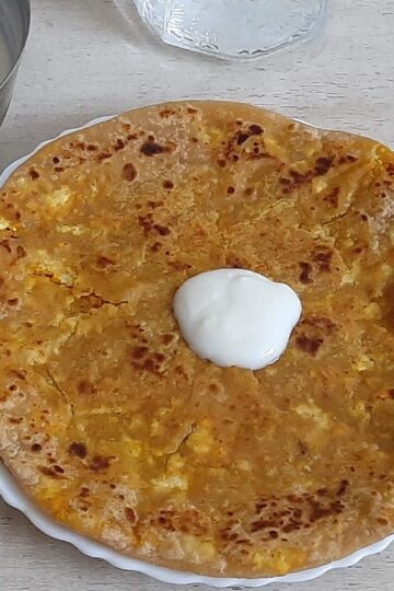 Paneer paratha with curd