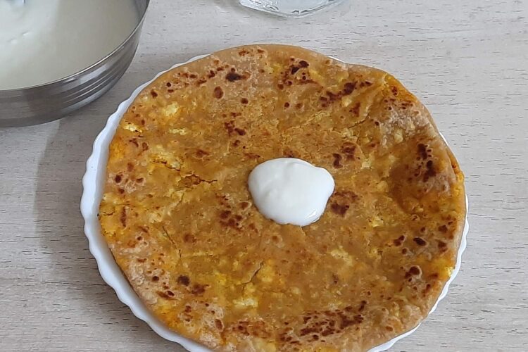 Paneer paratha with curd