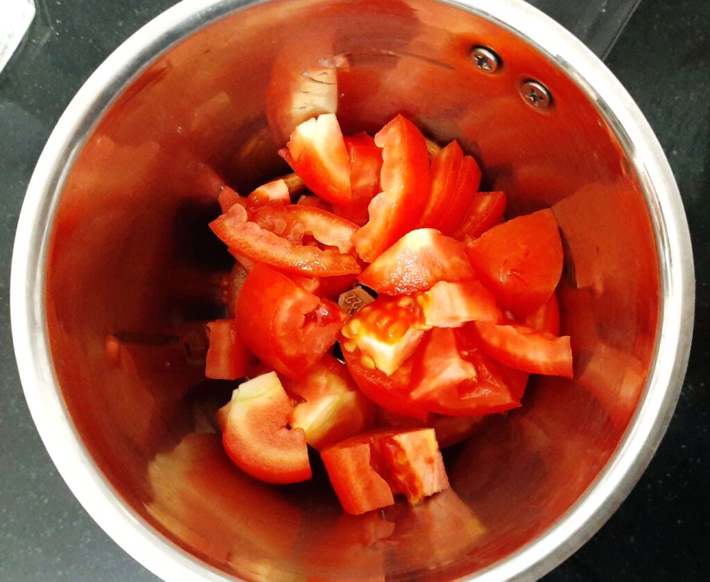 tomatoes in grinder