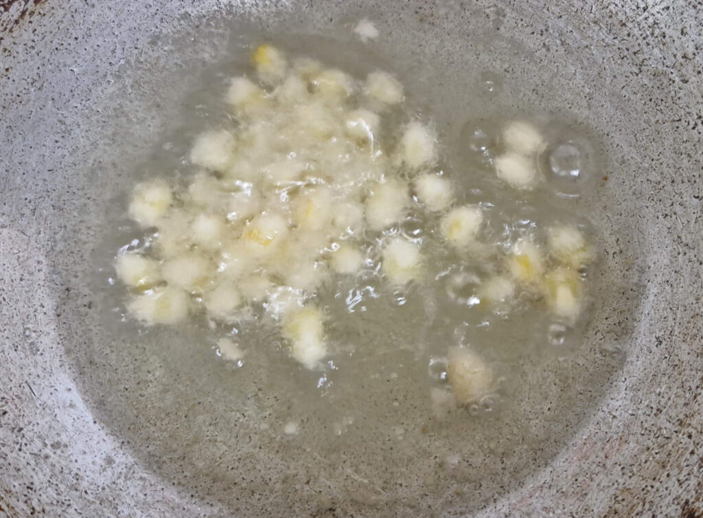 frying crispy corn