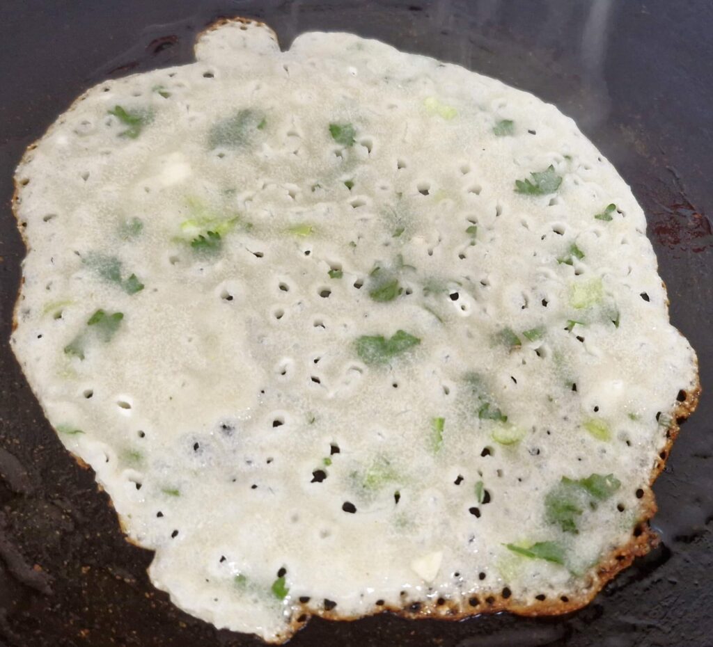 rava dosa on pan